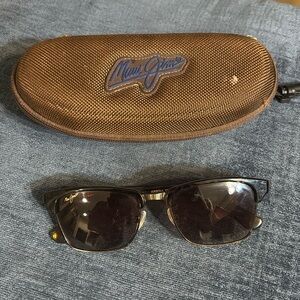 barley worn woman’s very stylish Maui Jim sunglasses